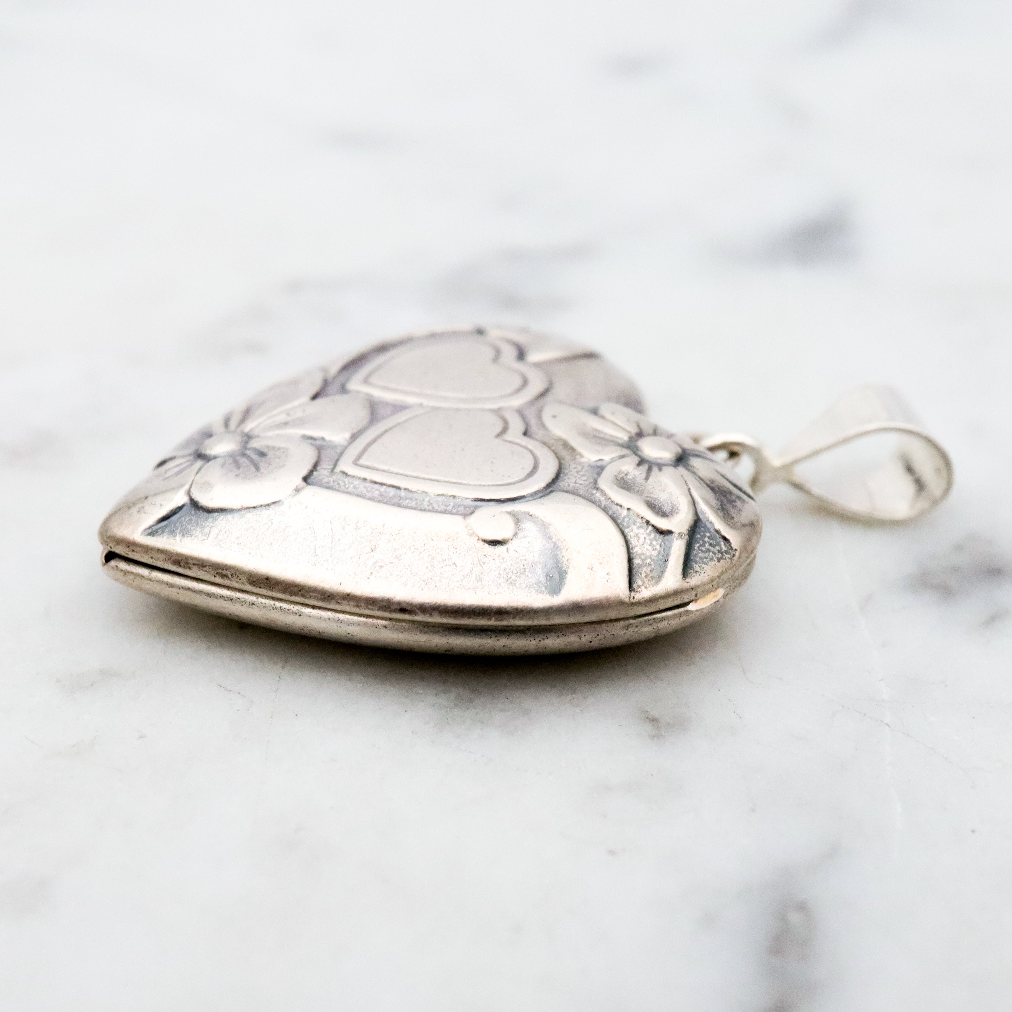 Antique sterling sweetheart locket pendant